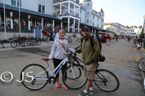 Brad and I with our bikes downtown Mackinac Island